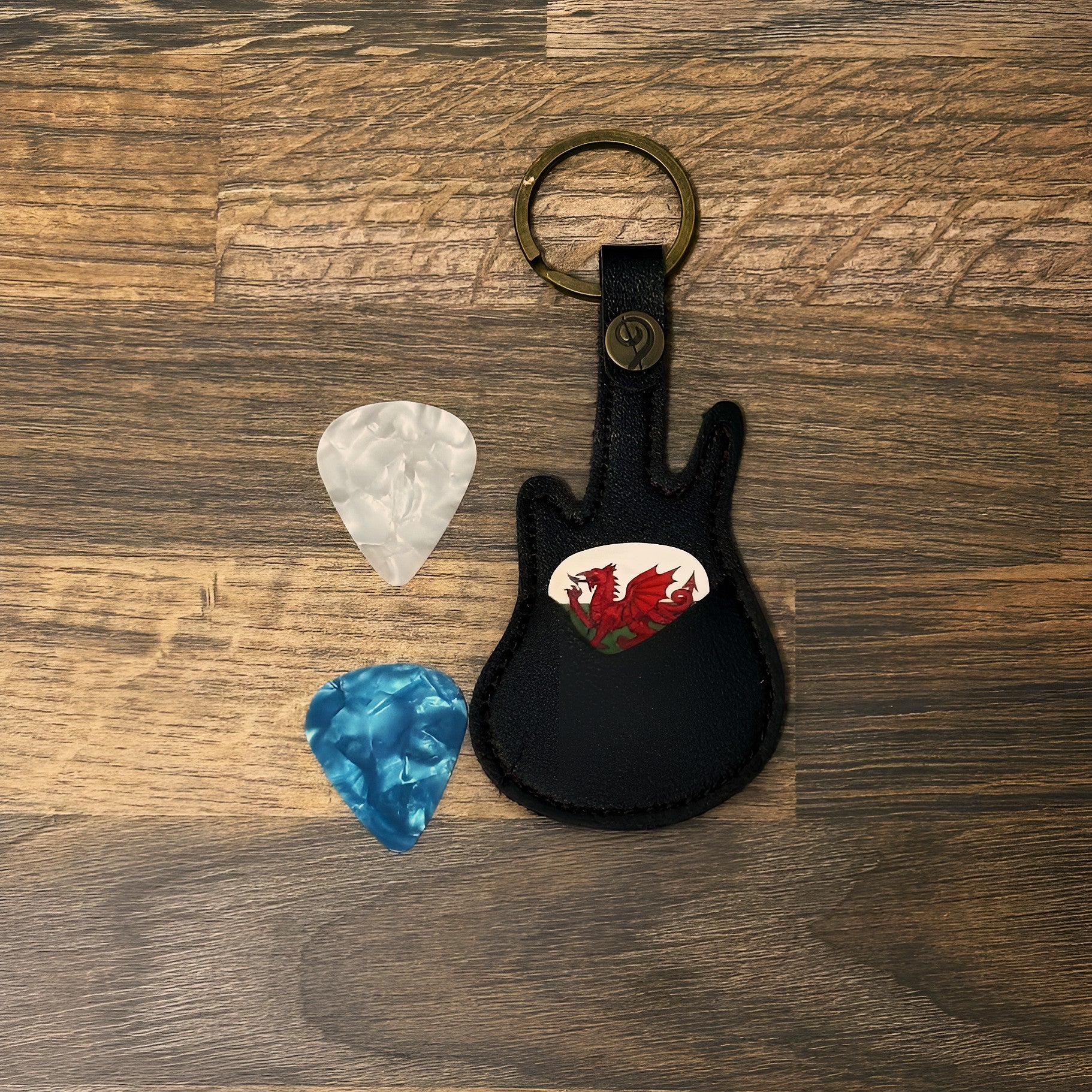 Guitar shaped pick holder